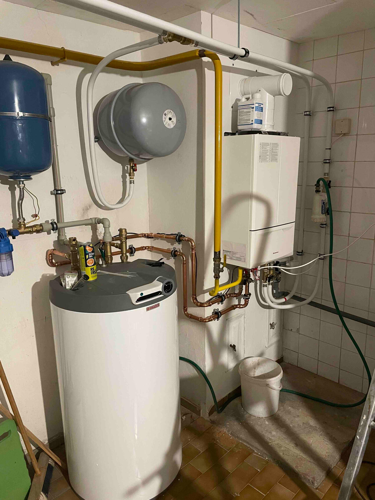 Výměna starého stacionárního atmosferického kotle za nový kondenzační kotel značky Immergas s nepřímotopným zásobníkem vody Dražice na 110l